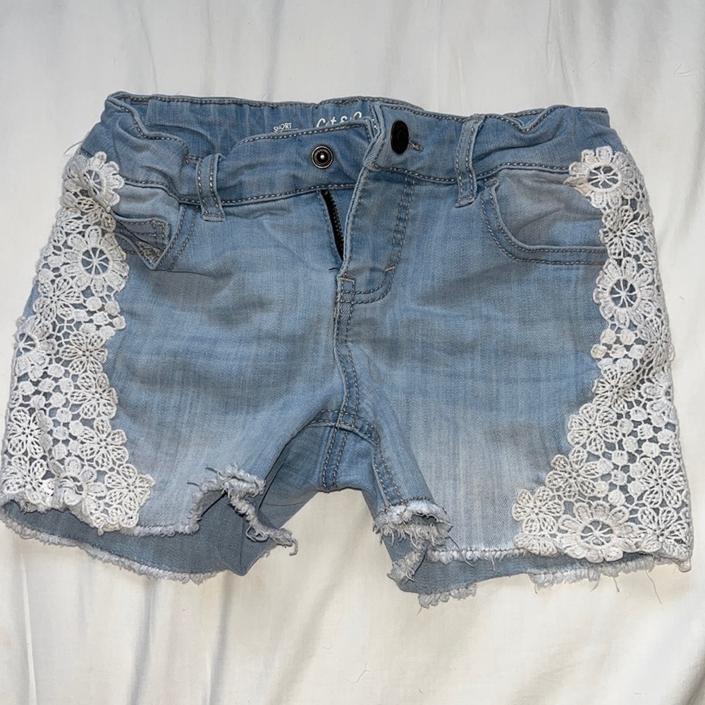 Target jean shorts with lace detail on the side size kids M/7-8